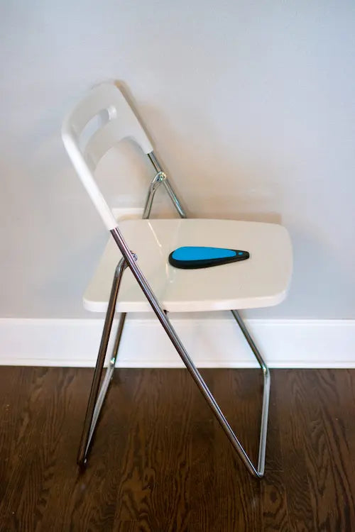 Kgoal Boost pelvic Floor Exerciser for Men and Women - on a chair