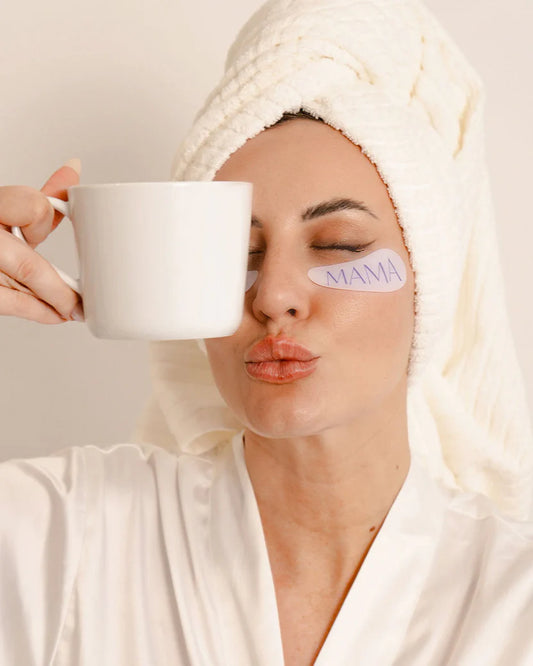 Woman with Yung bod eye masks on a beige background