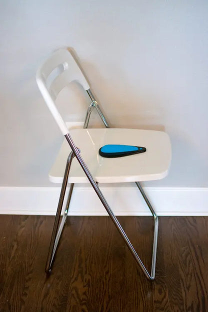 Kgoal Boost pelvic Floor Exerciser for Men and Women - on a chair